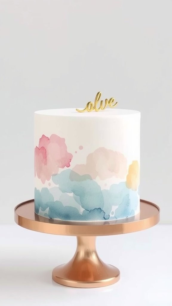 A chic watercolor buttercream cake with pink, blue, and yellow hues and a gold topper.